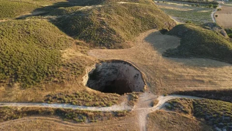 A hole in the field Stock Footage 158548672