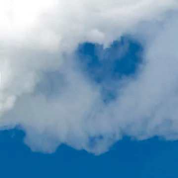 A hole in the form of a heart in a white cloud against a blue sky. A square p Stock Photos