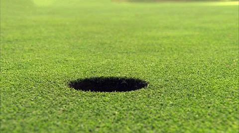 A hole on the golf course Stock Photos
