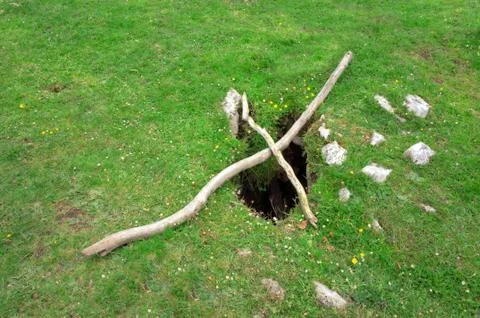 Hole in the grass Stock Photos