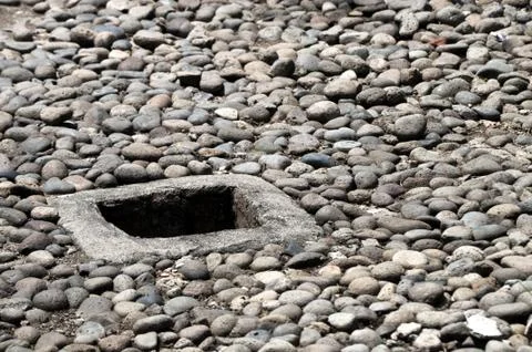 Hole in a ground Stock Photos