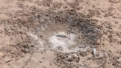 Hole in the ground from a powerful explosion. Disposal of explosives. Stock Footage 259504780