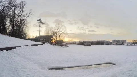 Hole in the ice on the pond in winter timelapse 스톡 동영상 79815620
