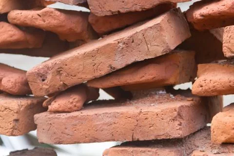 Hole in an old brick wall collapsing Stock Photos