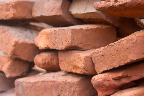 Hole in an old brick wall collapsing Stock Photos