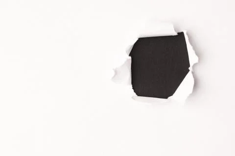 Hole in the paper background Stock Photos