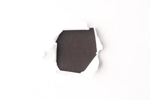 Hole in the paper background Stock Photos