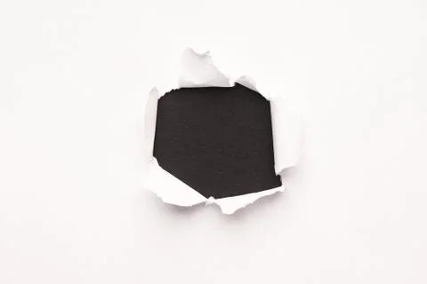 Hole in the paper background Stock Photos