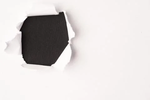 Hole in the paper background Stock Photos