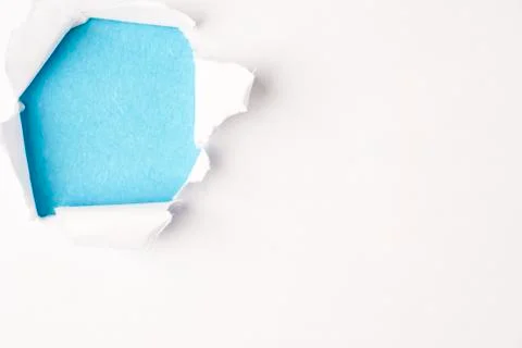 Hole in the paper background Stock Photos