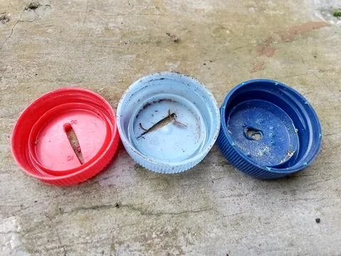 Hole in the plastic bottle cap. Фото