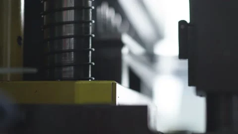 Hole punching machine operation Stock Footage 160498701