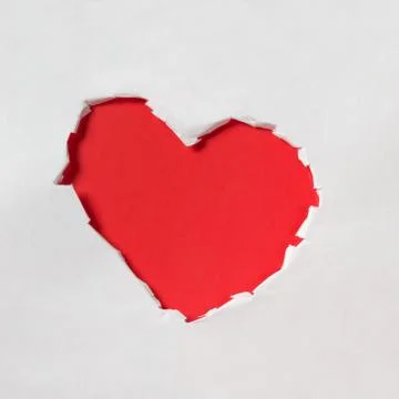 Hole in shape of a heart Stock Photos