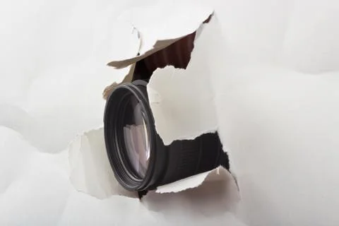 Hole in a sheet of paper Stock Photos