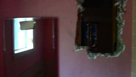 Hole Smashed In Bathroom Wall At Abandon Hotel Stock-Footage 106679144