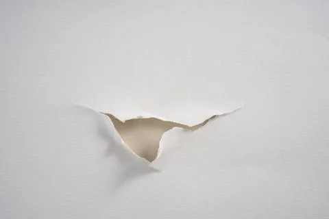 A hole torn Stock Photos