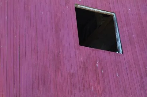 Hole in violet wall Stock Photos