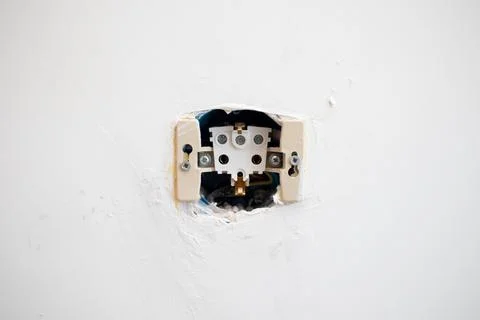 Hole in the wall for electrical Sockets box Stock Photos