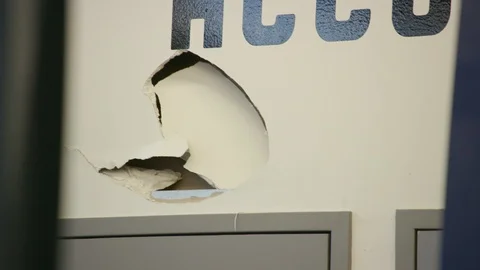 Hole in the wall Stock Footage 106592146