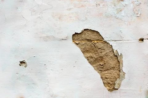 Hole in wall plaster Stock Photos