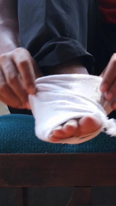 Hole in worn out sock Video stock 336706930