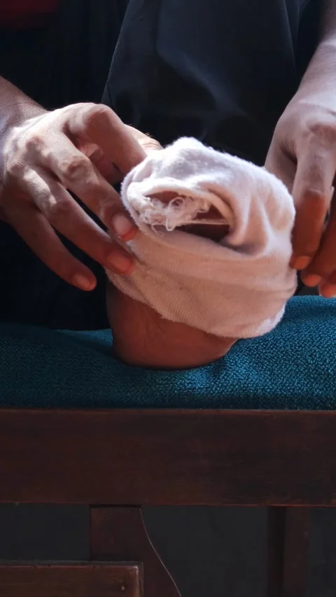 Hole in worn out sock Stock Footage 336707007