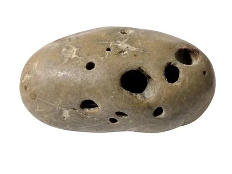 Holed stone. Stock Photos