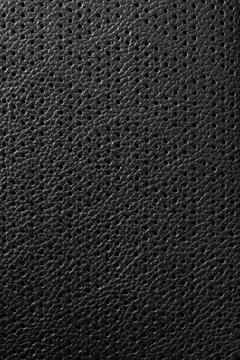 Holes in leather texture background Stock Photos