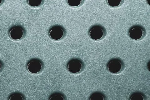 Holes in plastic plate. abstract pattern background Stock Photos