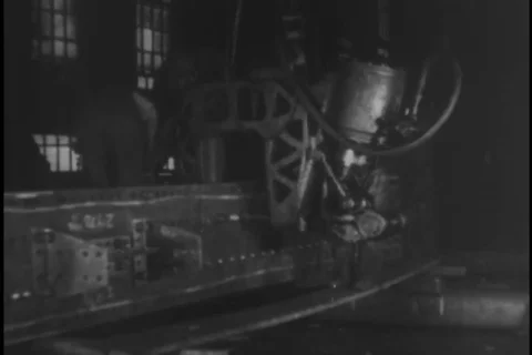 Holes punched or drilled into structural steel components - 1930 Stock Footage 104336420