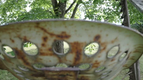 The holes on the rusty object inside the garage in Estonia Stock Footage 220691135