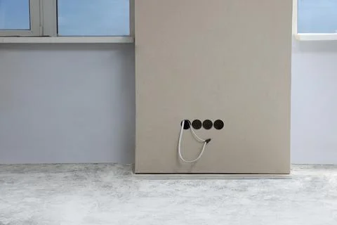 Holes for socket in wall preparing to renovation Foto stock