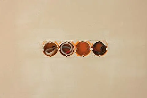 Holes for socket in white clean wall Foto stock