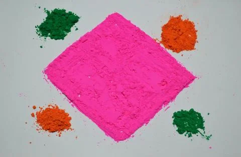 Holi celebrates with beautiful organic color and happy holi celebration in In Stock Photos