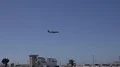 Holiday airplane above harbor of city Faro at Algarve, Portugal 4k or 4k+ Resolution