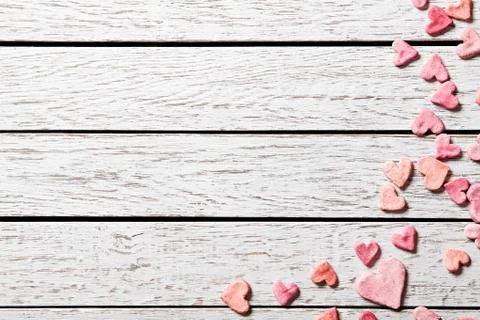 Holiday background with heap of small hearts Stock Photos