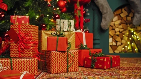 Holiday background. Presents, gift box, under the Christmas tree with colorful Stock Footage 99117384