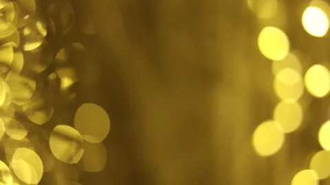 Holiday bokeh lights, active motion, golden yellow Stock Footage 300545457