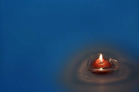 Holiday burning candlestick Stock Photos