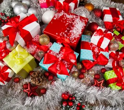 Holiday Christmas background with stack of presents Stock Photos
