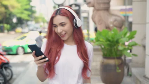 Holiday concept of 4k Resolution. Asian woman walking in the city. teenage .. Stock Footage 252598519