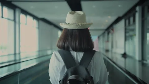 Holiday concept of 4k Resolution. Asian woman looking at map, she is planni.. Stock Footage 334970018