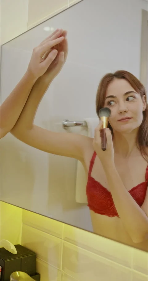 Holiday concept of 4k Resolution. Reflection of a young woman in underwear .. Stockbeeldmateriaal 316423030