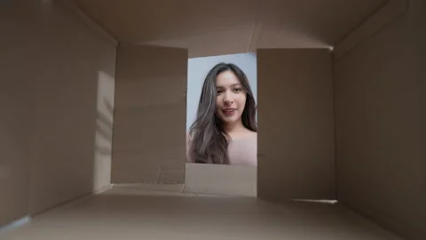 Holiday concept of 4k Resolution. The young woman opened the box and looked a Video stock 164065458