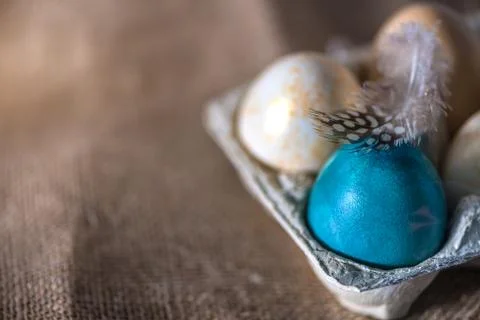 Holiday Easter card with easter eggs in a paper box Stock Photos