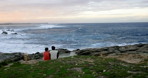 Holiday feeling for these middle aged people on the beach. Beautiful light Stock-Footage 103295817
