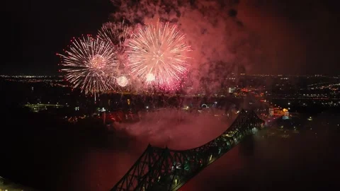 Holiday fireworks above water with reflection on the black sky background Stock Footage 346549084