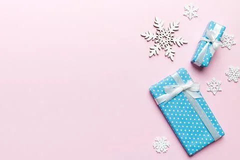 Holiday flat lay with gift boxes wrapped in colorful paper and tied decorated Stock Photos