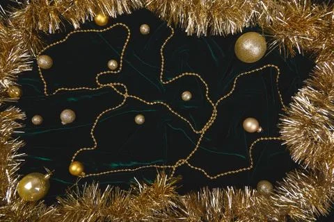 Holiday frame, pattern made balls and gold  sparkle, confetti. Stock Photos