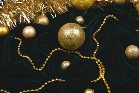 Holiday frame, pattern made balls and gold  sparkle, confetti. Stock Photos